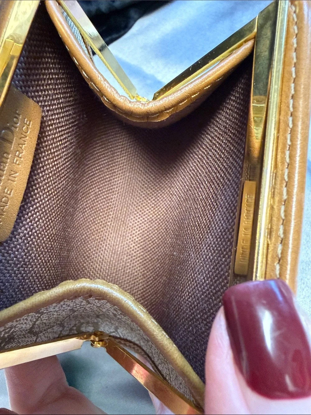 Dior honeycomb kiss lock coin purse.